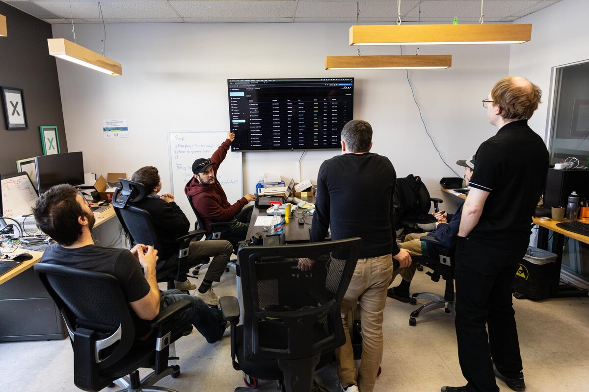 The IDeo team reviewing architecture together